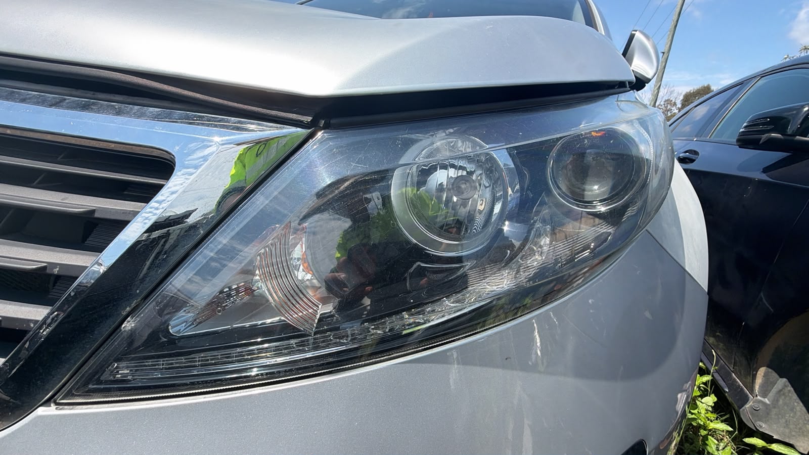 2011 Kia Sportage L/H HEADLIGHT